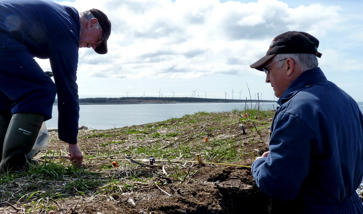 Rémi d'Entremont helping me with the stakes - North Brother, May 1, 2013 - Mark Field photo